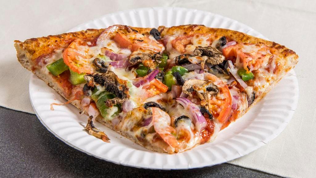 #2. Veggie Delight Pizza · Fresh mushroom, onion, green pepper, black olive and fresh sliced tomatoes. Made from fresh dough and with special sauce.
