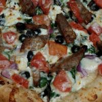 #5. Greek Pizza · Gyro meat, spinach, onion, black olive, mozzarella, provolone, feta cheese and fresh tomorro...