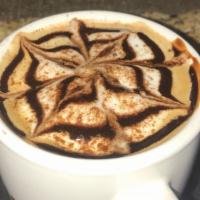 Mayan Mocha · Espresso and steamed milk with dark chocolate, cinnamon, and almond syrup