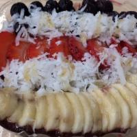 Tropical Açai · Strawberries, banana, blueberries, shaved coconut and honey