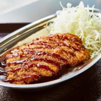 Chicken Katsu Curry · Panko-breaded fried chicken cutlet, drizzled with tonkatsu sauce, served with shredded cabba...