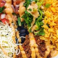 Impossible Bowl · The plant based meat cooked in our vegan chile sauce, mexican rice, black beans, cheese, pic...