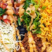 Impossible Vegan Bowl · The plant based meat cooked in our vegan chile sauce, mexican rice, black beans, pico de gal...