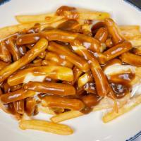Disco Fries · Melted cheese over French fries and topped with brown gravy.
