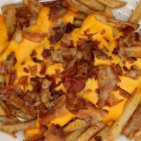 Loaded Fries · Loaded with bacon bits and melted Cheddar cheese.