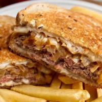 Classic Patty Melt · Topped with melted Swiss cheese and grilled onions on grilled rye bread.