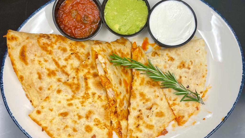 Chicken Quesadilla · Grilled flour tortilla stuffed with grilled chicken, Jack and Cheddar cheeses, and diced tomatoes.