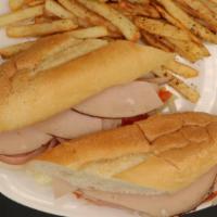Turkey Hoagie · Oven-roast turkey thinly sliced with lettuce, tomato, and onion.