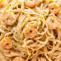 Cajun Chicken & Shrimp Alfredo With Pasta · Chicken breast and shrimp in a rich Parmesan butter cream sauce with a sprinkle of Cajun spi...