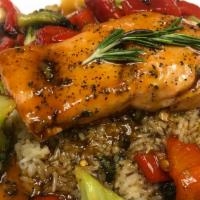 Bourbon Salmon · Broiled fillet of salmon topped with sweet bourbon glaze.Served over white rice