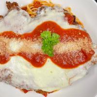 Chicken Parmigiana With Pasta · Breaded chicken breast topped with mozzarella cheese and marinara sauce. Served with pasta.