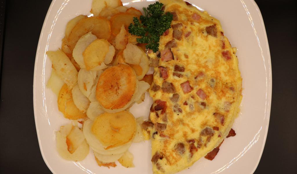 Meatlovers Omelette · Four-egg omelette with bacon, sausage, and ham.