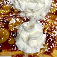 Caramelized French Toast · Three big slices of our homemade, cinnamon battered French toast topped with caramel sauce, ...