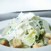 Caesar Salad · Homemade dressing, shaved parmesan.