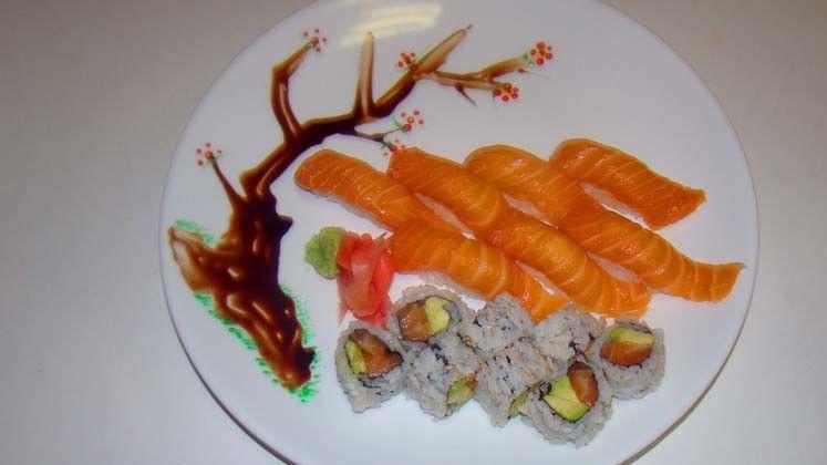 Salmon Lover Sushi Entrée · 7 pieces salmon sushi and salmon avocado roll.