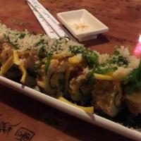 Fire Ball Roll · Lightly fried with spicy tuna, avocado, topped with fly fish roe, scallion, and chef's speci...