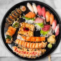 Sushi & Sashimi Boat (Small) · Four rolls, nine pieces sashimi, six pieces nigiri.