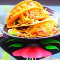 Tex Mex Tacos · Three tacos soft corn, soft flour, or crispy corn with your choice of filling. Topped with l...