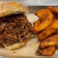 Pulled Pork Sandwich · Our home smoked pulled pork on a fresh Sarcone's roll served with rustic fries!