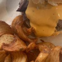 Brisket Sandwich · Our house smoked Texas style brisket topped with beer cheese an our sweet smokey BBQ sauce s...