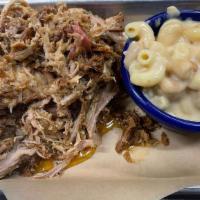 Pulled Pork Platter · 1/2 lb slow smoked pulled pork with coleslaw and one side