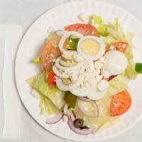 Greek Salad · Entrees sized. Feta cheese, tomatoes, olives, onions, peppers and cucumbers. Served with our...