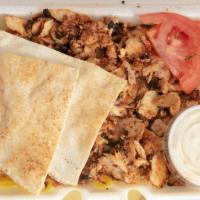 Chicken Shawarma Platter · Choice of rice or French fries, garlic sauce, pita bread and pickles. Add bread for an addit...