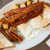 2 X 2 X 2 · Two large eggs, any style with two strips of bacon and two sausages. Your choice of toast an...