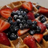 Patriot Belgian Waffle · One Belgian waffle topped with strawberries and blueberries. Topped with whipped cream.
