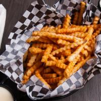C Fries And Cheese · Seasoned french fries with melted American cheese dipping sauce