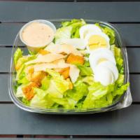 Caesar Salad · Romaine lettuce, Parmesan cheese, egg, and seasoned croutons.