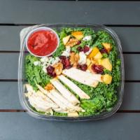 Kale & Grilled Chicken Salad · Kale leaves, apple chunks, dried cranberries, gorgonzola cheese, and raspberry vinaigrette.