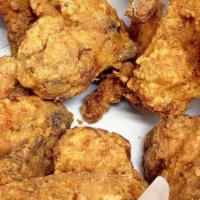 Chicken Wing (10) · 10 pieces. cooked wing of a chicken coated in sauce or seasoning.