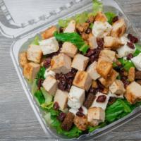 Cranberry Walnut Salad · Romaine hearts, grilled chicken, dried cranberries, cied walnuts, croutons  feta cheese reco...