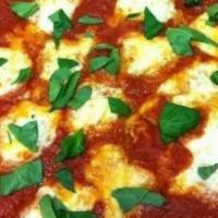 New Yorker Pizza · Red sauce, fresh mozzarella and  fresh basil.