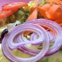 Side Salad · Lettuce, tomato, red onion, red cabbage, cucumbers, carrots and croutons.