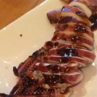 Ika Yaki · Grilled whole Japanese squid, served with eel sauce.