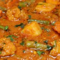 Vegetable Curry With Rice (V) · Gluten-free. Mixed vegetables cooked with chef special  masala sauce.