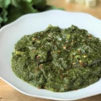 Palak Saag With Rice (V) · Vegetarian. Fresh spinach with homemade cheese cubes cooked in mild spices and herbs.