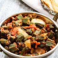 Bhindi Masala With Rice (V) · Vegan, gluten-free. Stir-fried okra with tomato seasoning and stir-fried onions.