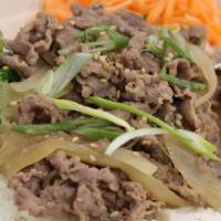 New! Beef Bowl (Gyu-Don) · Thinly sliced soy-marinated beef cooked with sweet onions. Served with white rice, English c...
