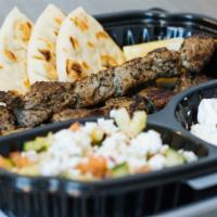 Skewers On A Plate · Served with 2 skewers, a mini villager salad, and your choice of aside. Tender cuts of grill...