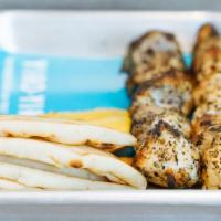 Naked Skewers · Served with 2 skewers. Tender cuts of grilled meat served with sliced lemon, a side of pita,...