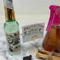 Protection Spray · Spray bottle of Protection goodness. Tourmaline chips, palo santo curls, and florida water, ...