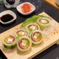 Fresh Green Roll(New!!!) · Tuna, salmon, cream cheese and avocado rolled in cucumber with spicy mayo on top and light v...