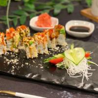 Lobster Maki · Crab Stick, avocado, tempura flakes, spicy mayo topped with Lobster, tobiko, wasabi, mayo, a...
