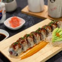 Truffle Foie Gras Maki · Chopped yellowtail mixed with truffle salt, truffle oil, and scallions. Topped with seared f...