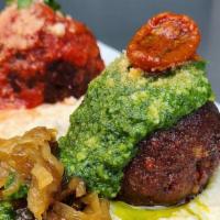 Duo Of Meatballs · two impossible meatballs, whipped ricotta
one paired with san marzano gravy, garlic, broccol...