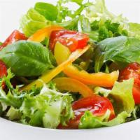 Garden Salad · Vegan. Mixed greens, tomatoes, cucumbers, shredded carrots, herb vinaigrette dressing.