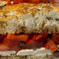 The Tuscan · Fresh mozzarella cheese, roasted red peppers, tomatoes, basil leaves, olive oil, balsamic vi...